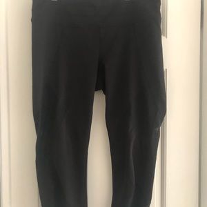 Athleta cropping leggings with mesh on the side.